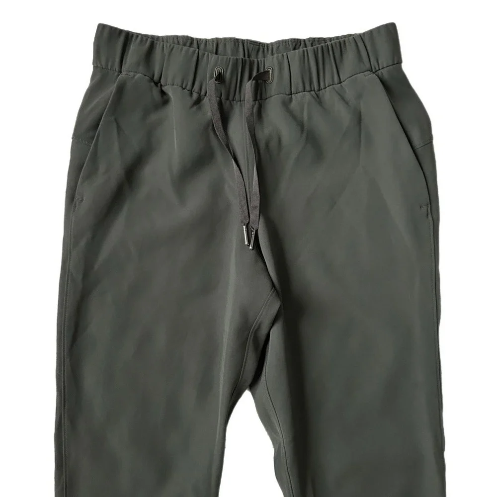Lululemon On the Fly Pant Woven Dark Olive Green W5BM4S Size 4